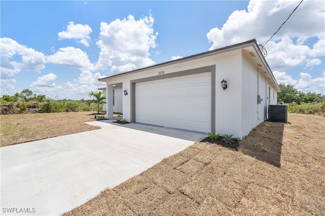 garage featuring central air condition unit