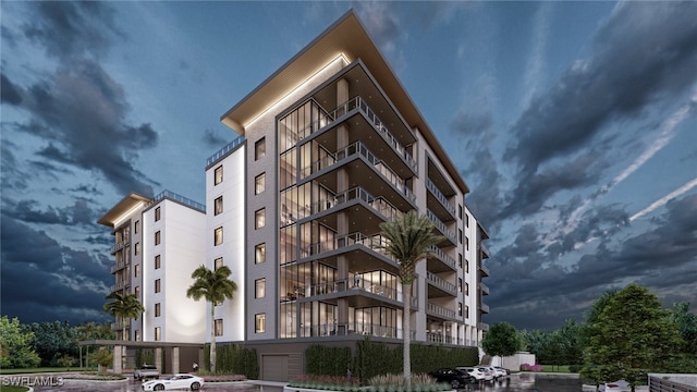 750 Goodlette-Frank Rd N Unit 202, Naples, FL 34102 - view of outdoor building at dusk