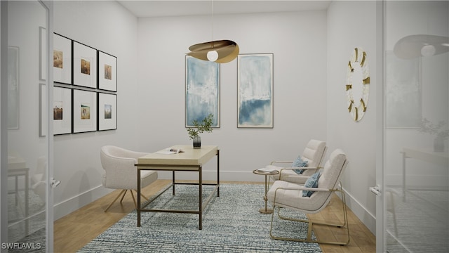 750 Goodlette-Frank Rd N Unit 202, Naples, FL 34102 - sitting room with wood-type flooring