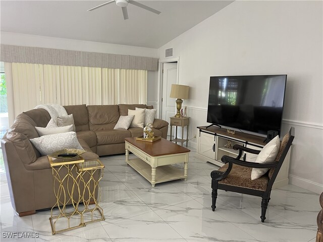 living room featuring lofted ceiling and ceiling fan