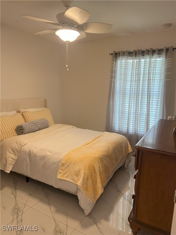 bedroom featuring ceiling fan