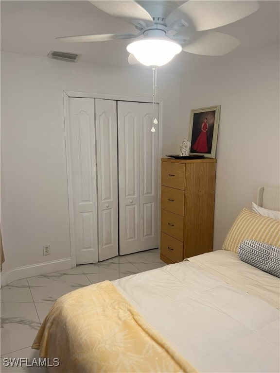 bedroom with a closet and ceiling fan