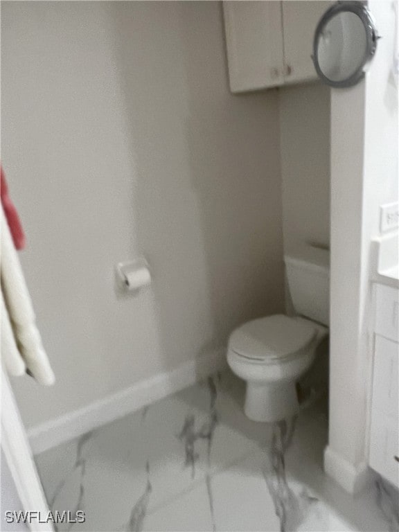 bathroom featuring toilet