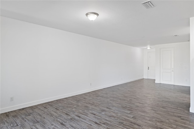 empty room with wood-type flooring