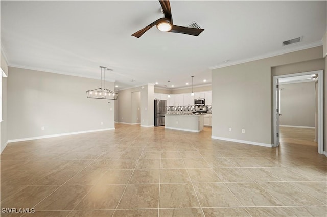 unfurnished living room with ornamental molding, light tile patterned floors, visible vents, and ceiling fan with notable chandelier