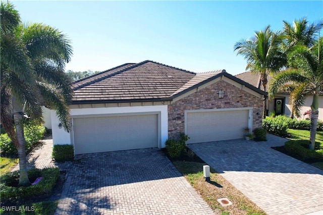 view of front of property featuring a garage