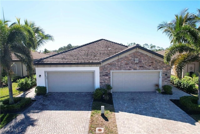 single story home with a garage