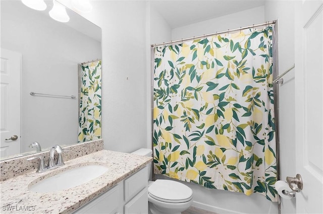 full bathroom with vanity, toilet, and shower / tub combo with curtain