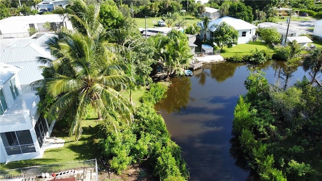 birds eye view of property featuring a residential view and a water view