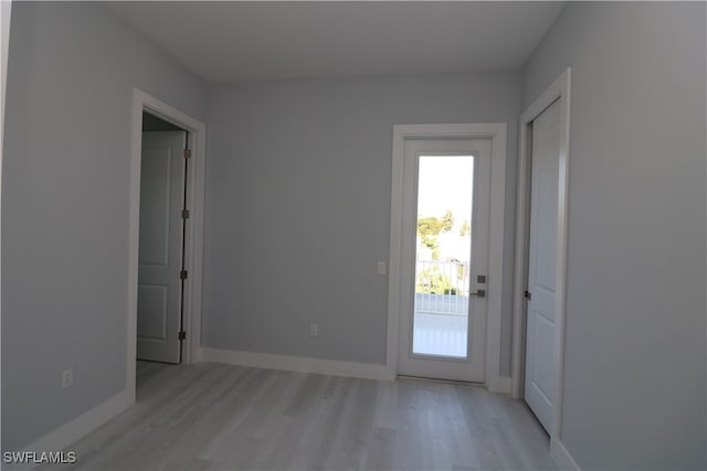 entryway with light hardwood / wood-style flooring