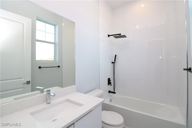 full bathroom with vanity, bathing tub / shower combination, and toilet