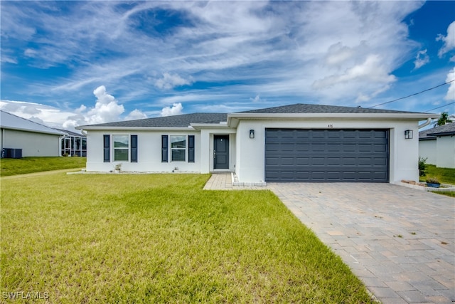 ranch-style home with central air condition unit, a garage, and a front yard