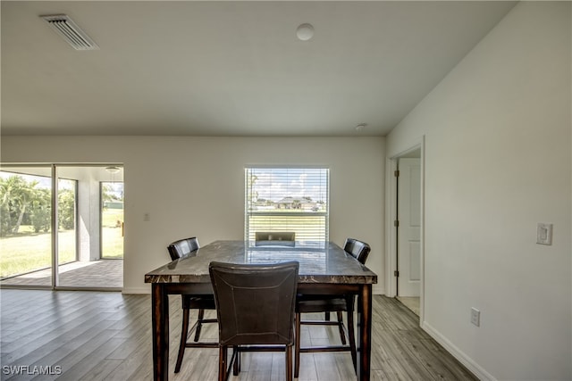 dining room featuring light hardwood / wood-style floors