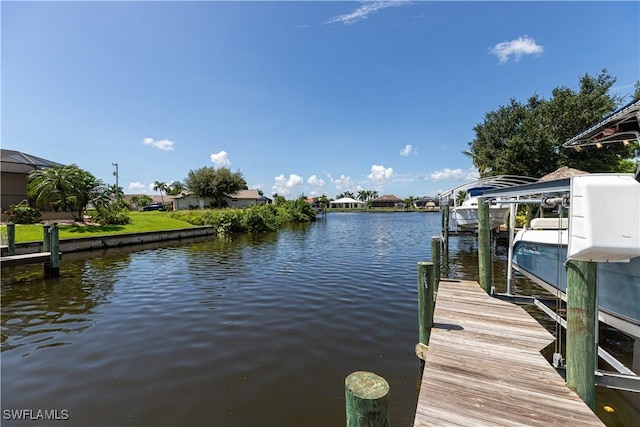 dock area featuring a water view and boat lift