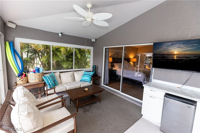 interior space with lofted ceiling and a ceiling fan