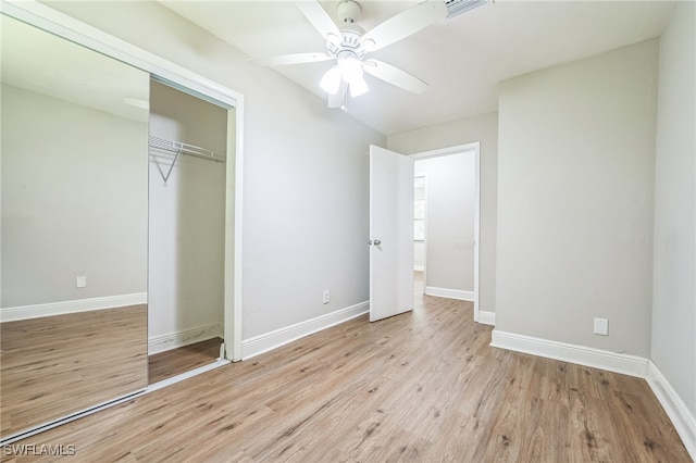 unfurnished bedroom featuring a closet, ceiling fan, and light hardwood / wood-style floors