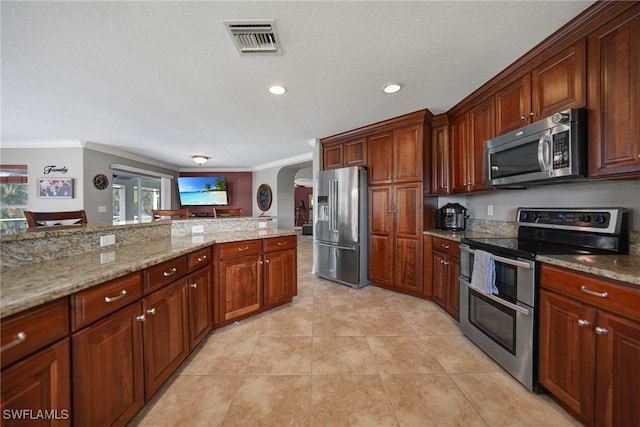 kitchen featuring crown molding, light tile patterned floors, light stone countertops, and appliances with stainless steel finishes