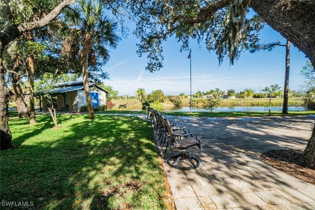 view of yard with a water view