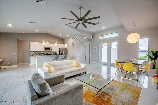 living area featuring lofted ceiling, french doors, visible vents, and light tile patterned floors