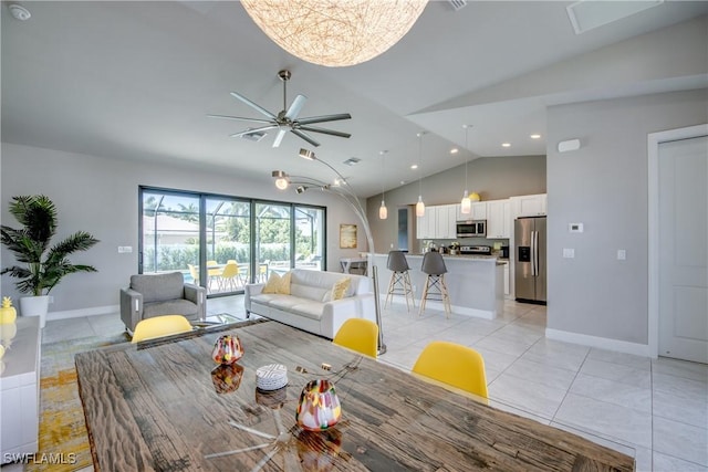 dining room with light tile patterned floors, baseboards, vaulted ceiling, and recessed lighting