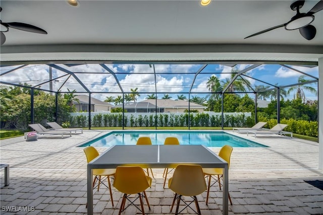 view of pool featuring a lanai, a patio area, and a fenced in pool