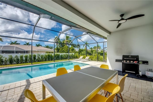 view of swimming pool featuring a fenced in pool, a patio, area for grilling, ceiling fan, and a lanai