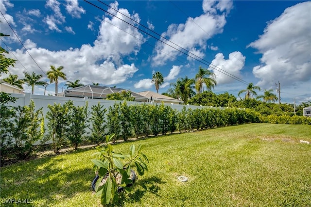 view of yard featuring fence