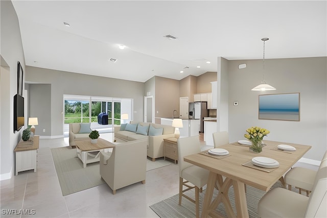 tiled living room with high vaulted ceiling