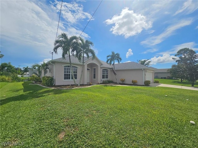 view of front of house featuring a front lawn, concrete driveway, a garage, and stucco siding