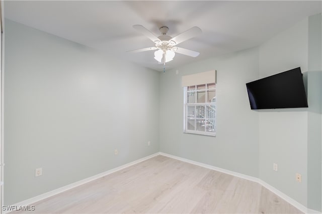 unfurnished room featuring light hardwood / wood-style flooring and ceiling fan