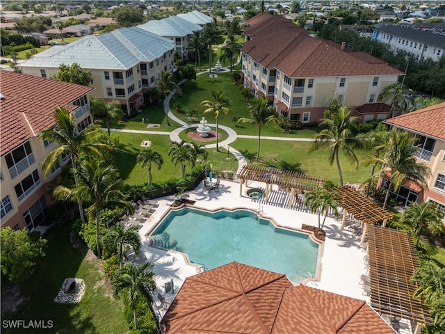 view of swimming pool featuring a patio area