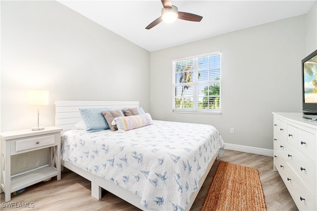 bedroom featuring light wood-type flooring and ceiling fan