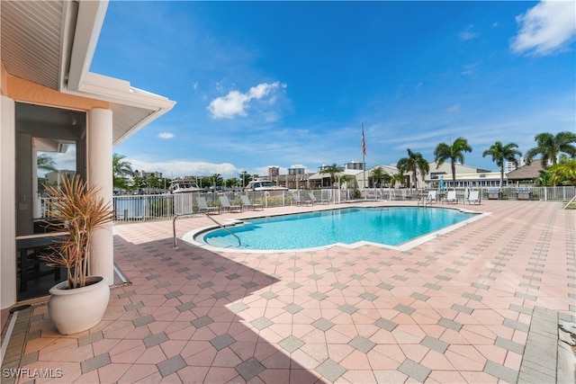 view of pool featuring a patio