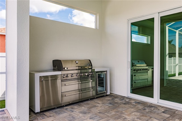 exterior space featuring stainless steel fridge, dark hardwood / wood-style floors, and wine cooler