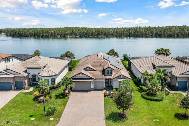 drone / aerial view with a water view