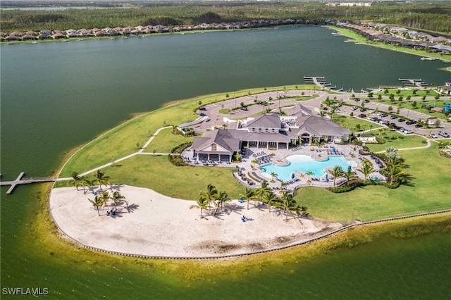 birds eye view of property with a water view