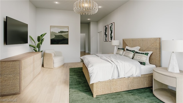 bedroom with hardwood / wood-style flooring and a notable chandelier