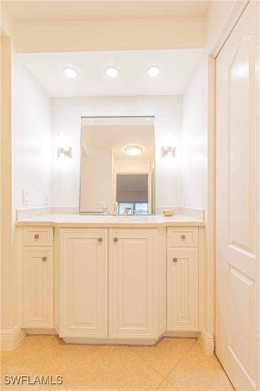 bathroom with vanity and tile patterned flooring