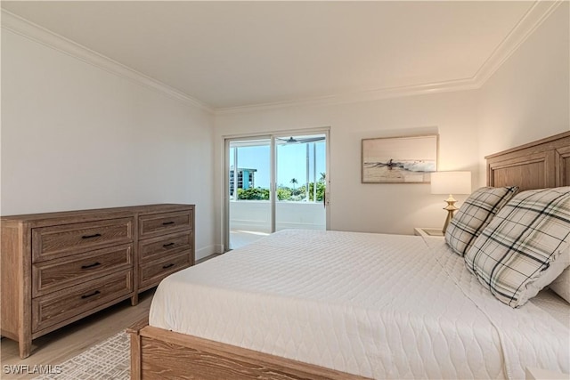 bedroom with crown molding, access to outside, and light hardwood / wood-style floors