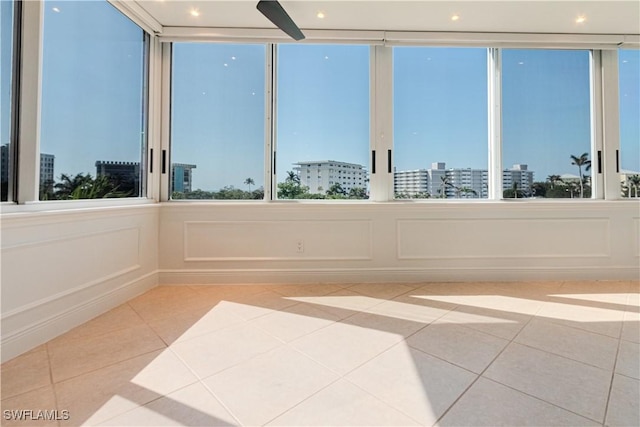 unfurnished sunroom featuring a healthy amount of sunlight