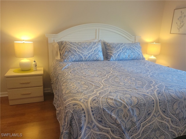 bedroom featuring wood-type flooring