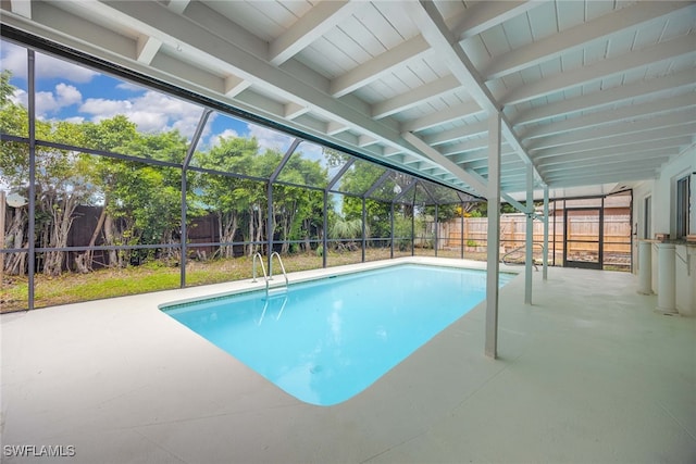 view of swimming pool with a patio area