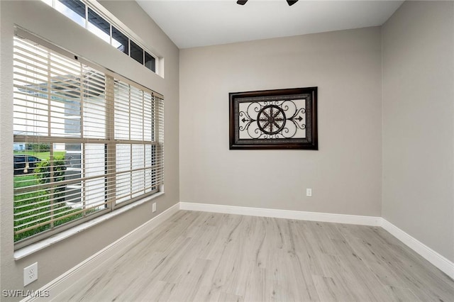 unfurnished room featuring ceiling fan and light hardwood / wood-style floors