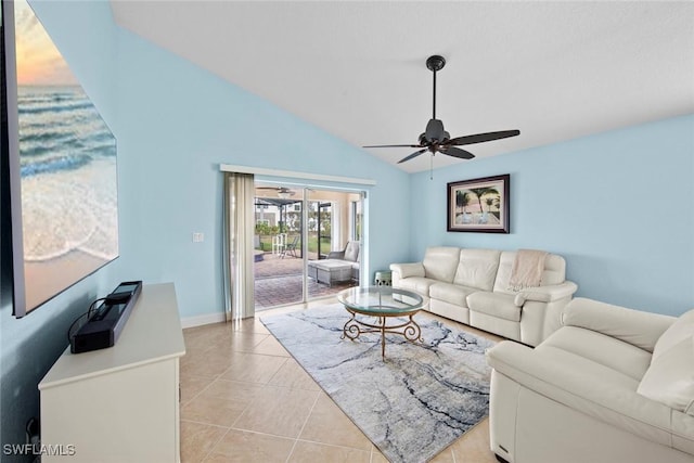 tiled living room with lofted ceiling and ceiling fan