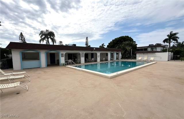 view of pool featuring a patio area