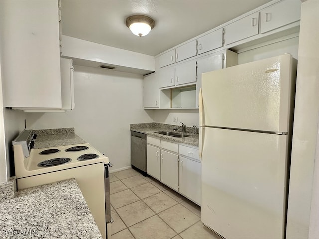 kitchen featuring white cabinetry, white appliances, sink, and light tile patterned floors