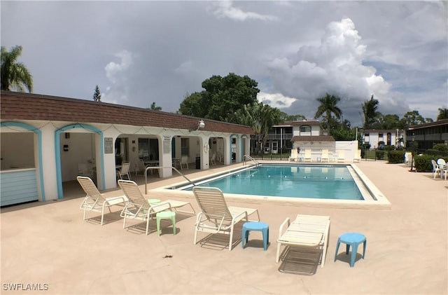 view of pool with a patio