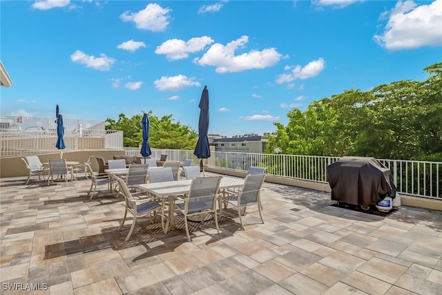 view of patio with a grill