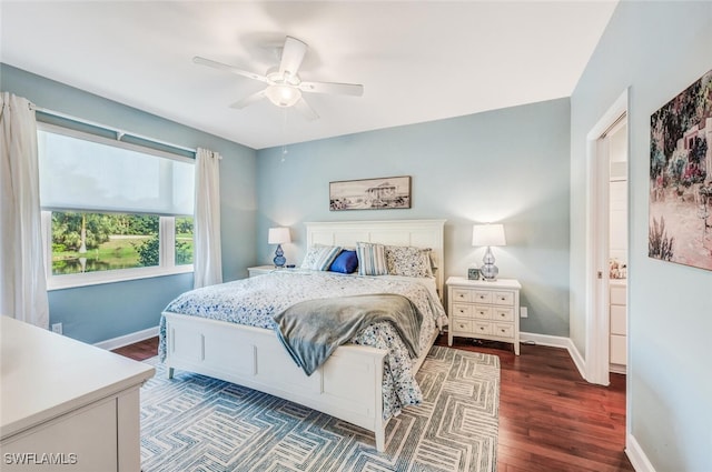 bedroom featuring dark wood-type flooring and ceiling fan