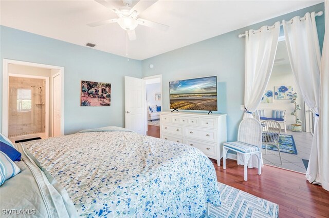 bedroom with dark wood-type flooring and ceiling fan